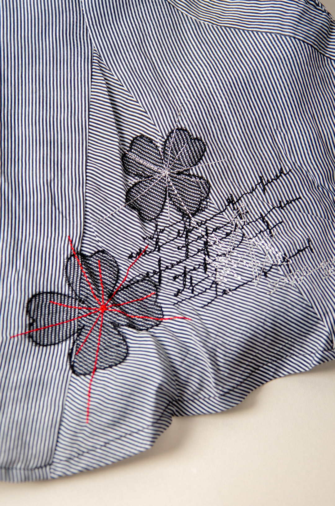 Soggo Collection thin striped blouse with embroidery and side pockets