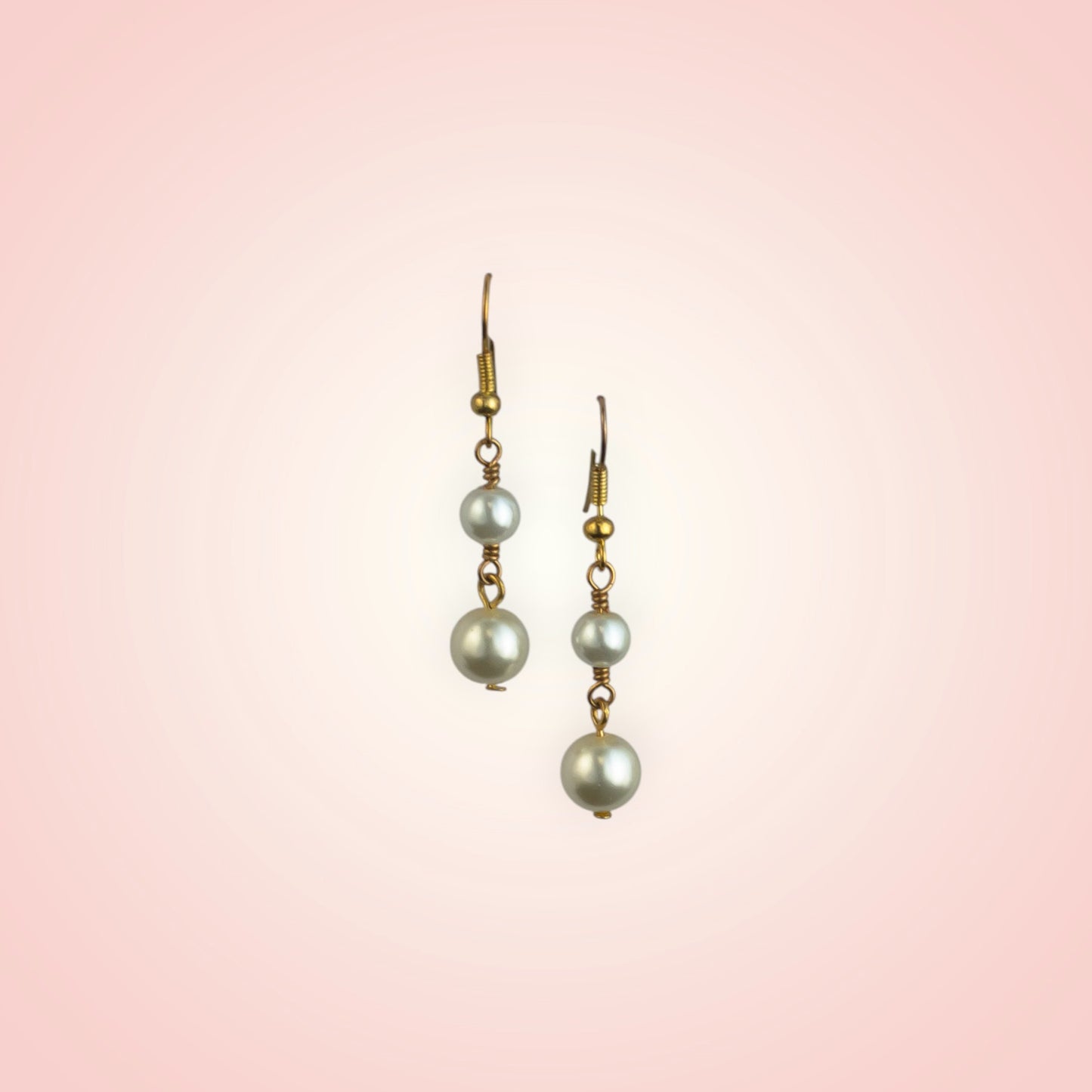 Earrings with two dangling pearls