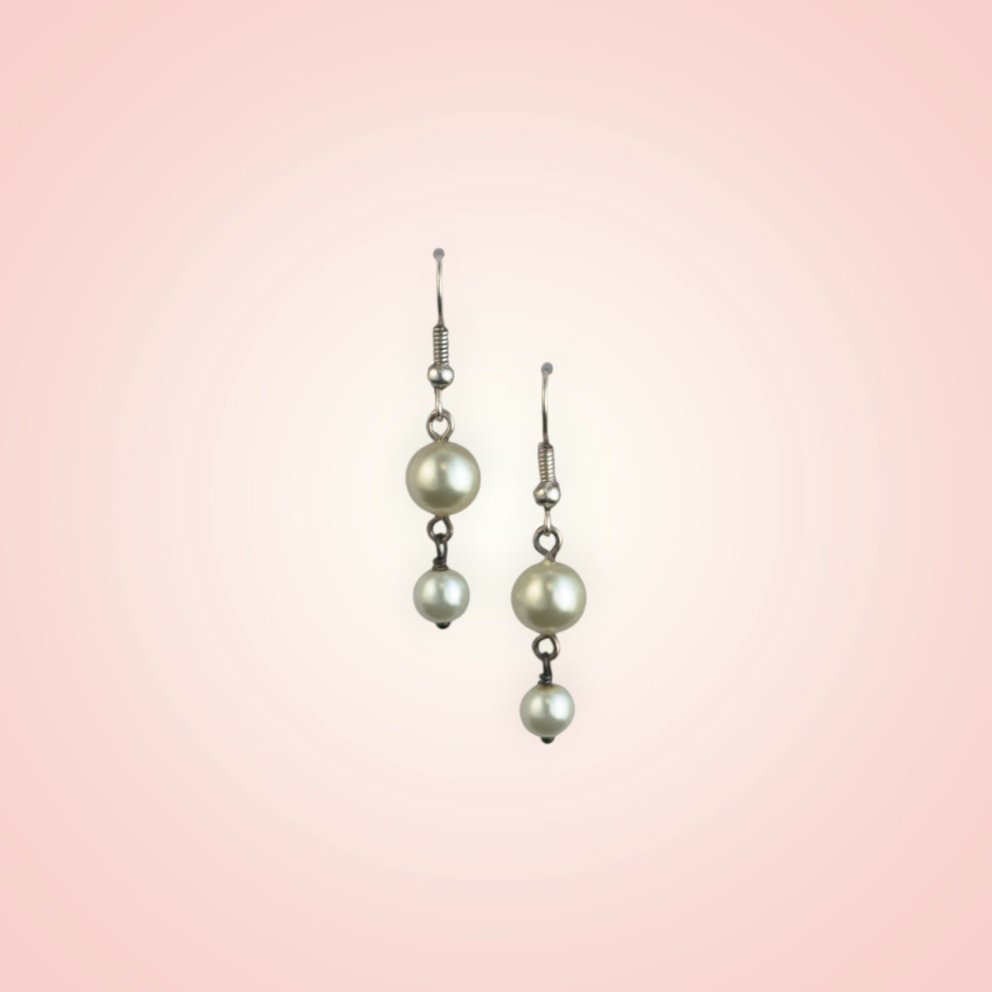 Earrings with two dangling pearls