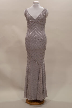 festive dress in grey silk decorated with silver sequins