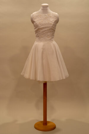 small off-white dress with an organza skirt