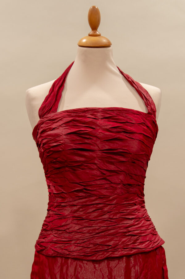 Red taffeta corset with a halter neckline