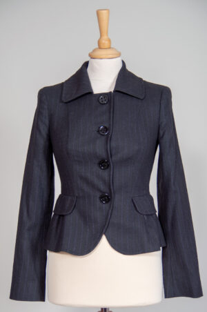 Jacket in striped fabric with peplum