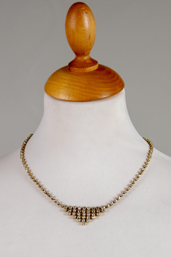 necklace with small crystals based on gold tone