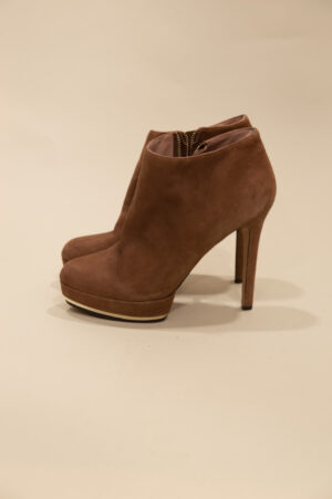 Vince Camuto brown suede ankle boots.