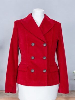 Red velvet jacket with black buttons.