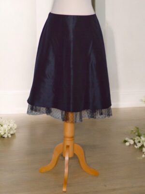 A-line short black formal taffeta skirt.