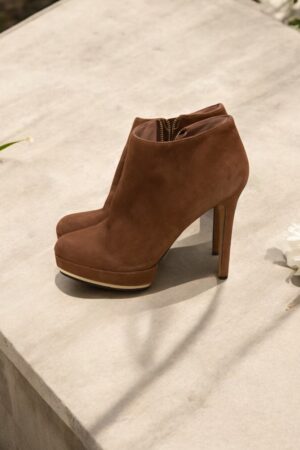 Vince Camuto brown suede ankle boots.