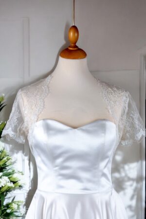 Festive natural white lace bolero for the bride.