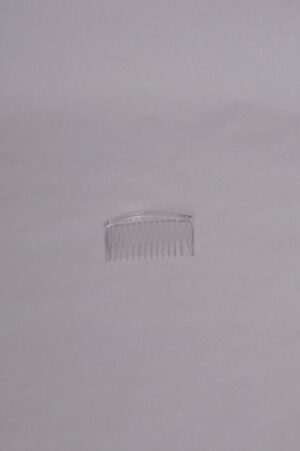 transparent comb for attaching a bridal veil or other decorations to the hair