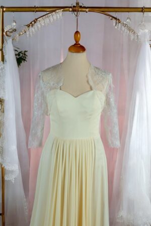 Festive natural white lace bolero for the bride.