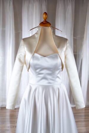 Natural white satin festive bolero for the bride.