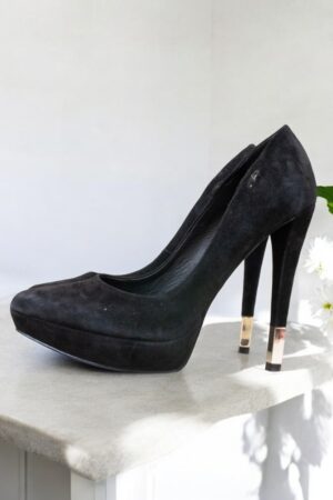 Guess black suede high heel platform shoes.