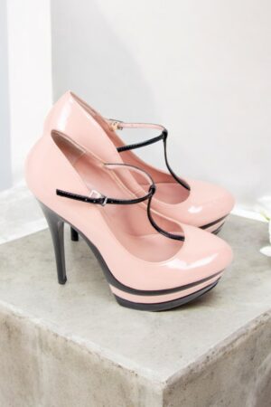 Pink and black patent leather platform shoes.