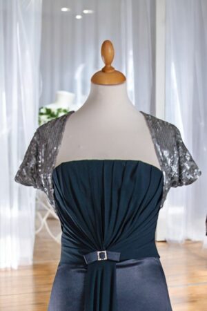 Festive gray bolero with short sleeves.