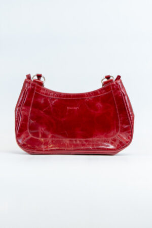 Red shiny leather handbag.