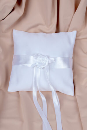 wedding ring cushion made of white satin