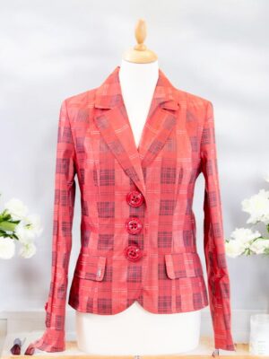 Plaid jacket with large buttons.