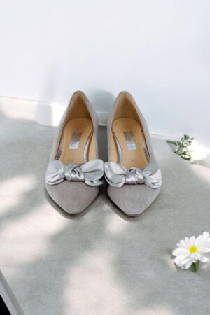 Gray suede low heel shoes.