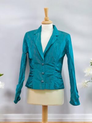 Barely used festive jacket in taffeta with metallic threads.