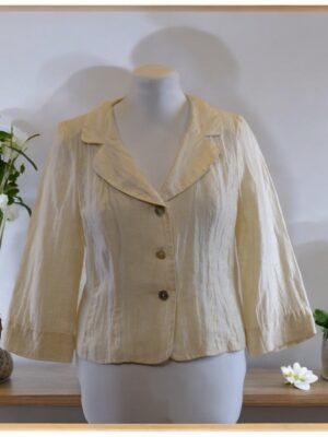 Cream formal jacket with lapel collar.