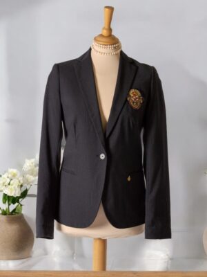 One-button black blazer with a fitted silhouette.