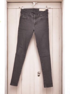 Slim-fit black women's jeans.