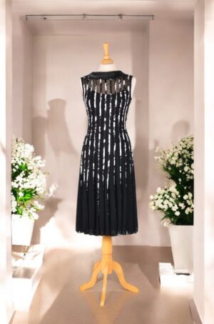 A spectacular black and white satin striped party dress