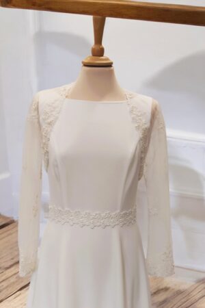 Festive natural white lace bolero for the bride.