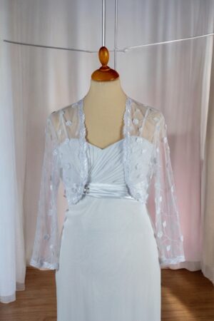 Festive white lace bolero for the bride.